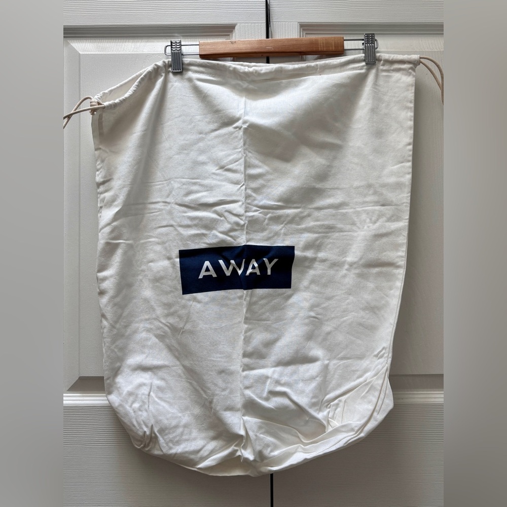 AWAY luggage branded dust cover/laundry bag.